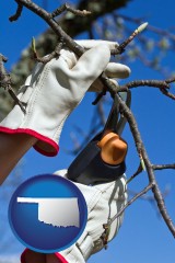 oklahoma map icon and a tree being trimmed with pruning shears
